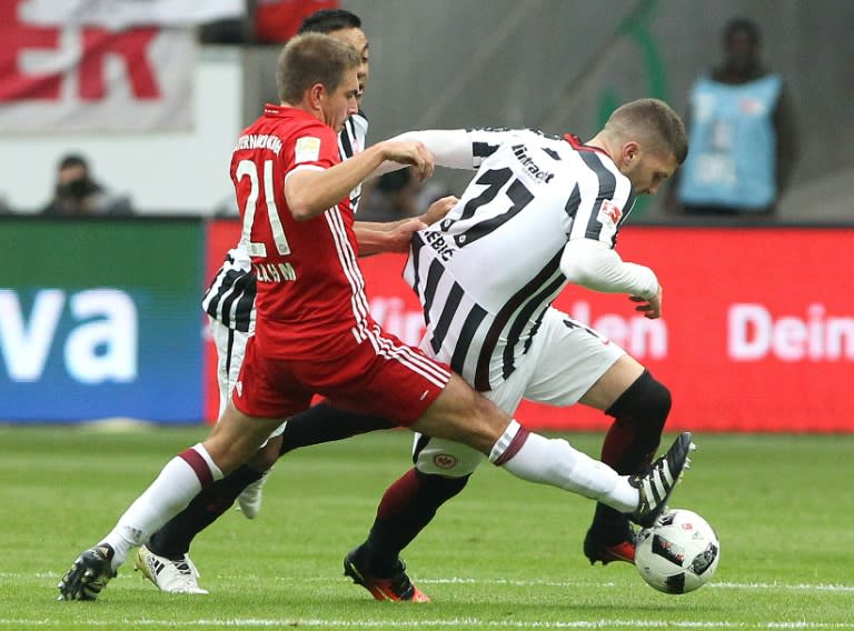 Philipp Lahm (left) tackles Ante Rebic in Bayern Munich's match against Eintracht Frankfurt on October 15, 2015