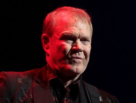 Singer Glen Campbell, currently on a farewell concert tour following his recent diagnosis with Alzheimer's disease, performs on stage at Club Nokia in Los Angeles, California October 6, 2011. REUTERS/Jonathan Alcorn/File Photo