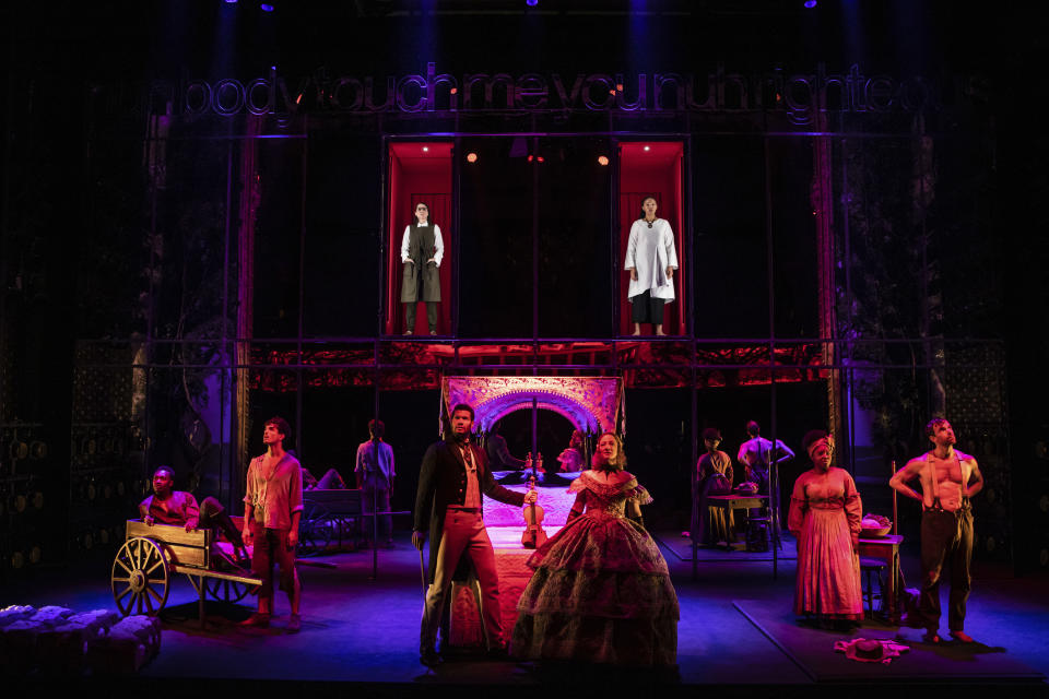 The cast of "Slave Play" appears during a performance in New York. For his striking scenic design in "Slave Play," set designer Clint Ramos has earned a 2021 Tony Award nominations. He also received a nod for best costume design for “The Rose Tattoo.” (Matthew Murphy/DKC O&M Co. via AP)