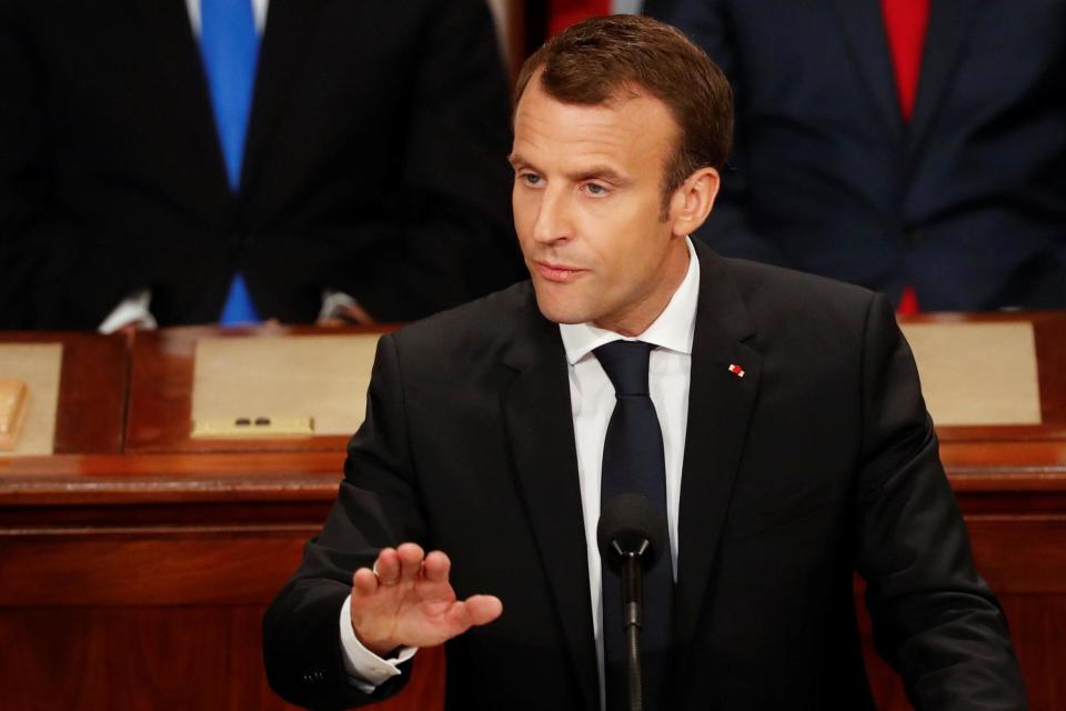 Defiant: French President Emmanuel Macron addresses Congress: REUTERS