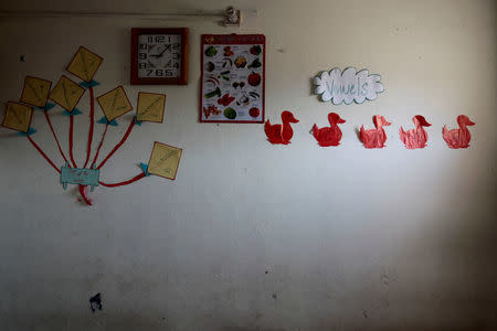 Pictures and charts are displayed on a classroom wall at the Mashal Model school in Islamabad, Pakistan, September 26, 2017. REUTERS/Caren Firouz