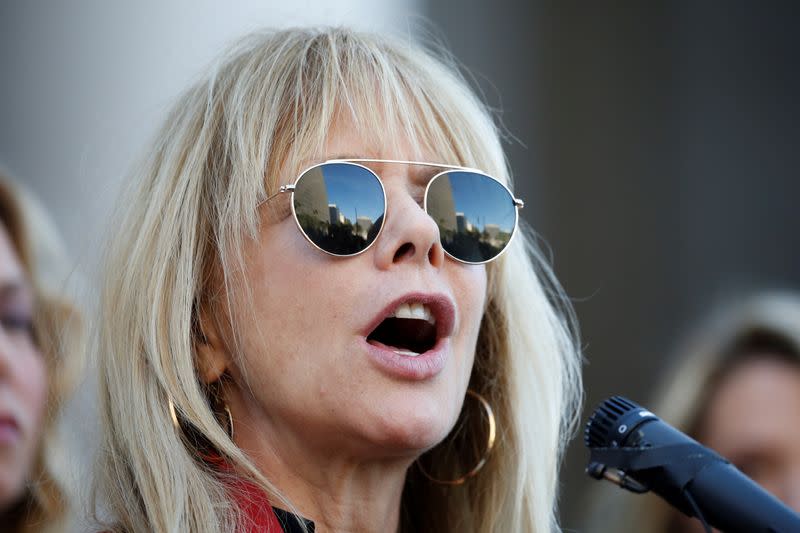 Rosanna Arquette speaks with The Silence Breakers, a group of women who spoke out about Harvey Weinstein's sexual misconduct, during a news conference outside Los Angeles City Hall following the verdict in New York of the Harvey Weinstein trial