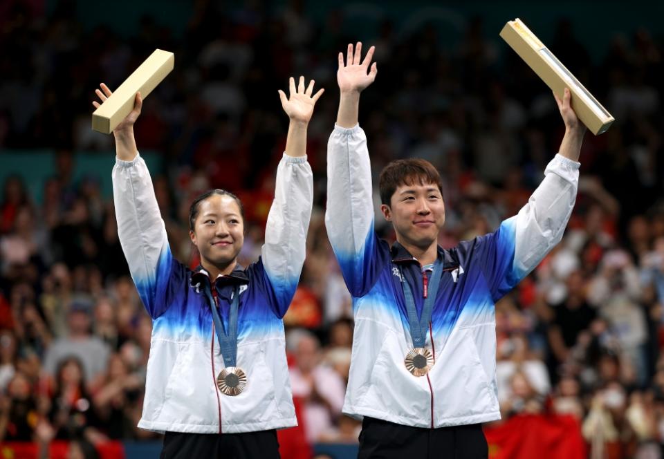 Shin Yu-bin (à gauche) a remporté la médaille de bronze en double mixte cette année (Photo : Getty Images)