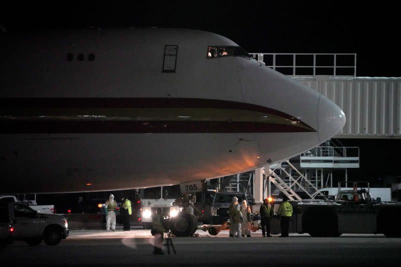 An aircraft chartered by the U.S. State Department to evacuate government employees from the novel coronavirus threat in the Chinese city of Wuhan, arrives at Ted Stevens Anchorage International Airport