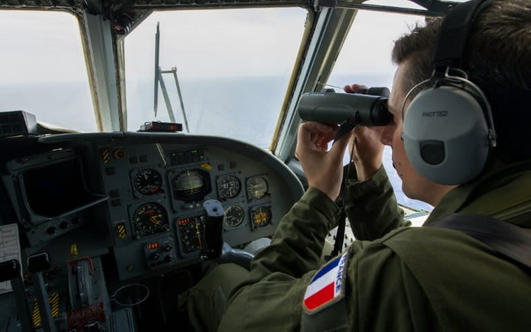 A French soldier searches for debris from the crashed EgyptAir flight MS804 over the Mediterranean Sea