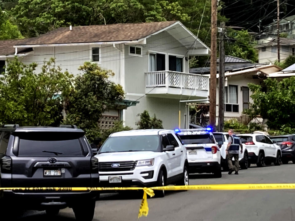 Honolulu police investigate the killings of multiple people at a home in Honolulu's Manoa neighborhood, March 10, 2024. (Craig T. Kojima/Honolulu Star-Advertiser via AP, file)