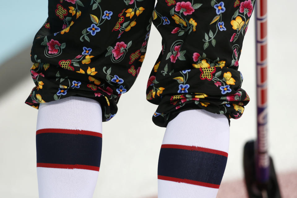 A Norwegian curler wears rose-painting knickers during curling training at the 2014 Winter Olympics, Saturday, Feb. 8, 2014, in Sochi, Russia. (AP Photo/Robert F. Bukaty)