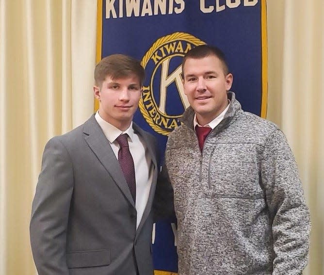 Ernie Davis Award winner Brady Keefe, left, with Elmira head coach Jimmy McCauley on Dec. 15, 2022 after the Express' Keefe won the Ernie Davis Award.