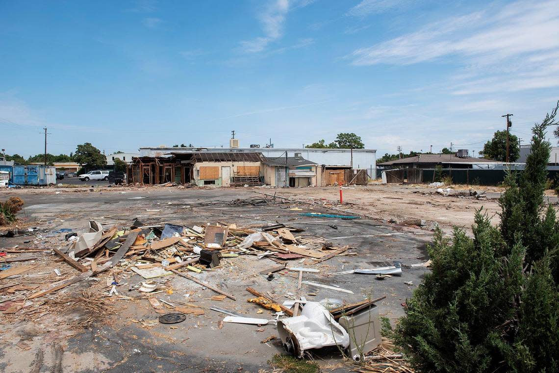 Debris scattered across the site as the Siesta Motel, located at 1347 W. 16th Street, is demolished in Merced, Calif., on Thursday, Aug. 4, 2022.