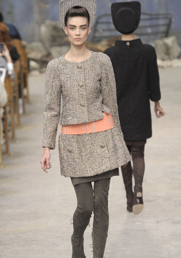 Chanel AW13 Couture: Models sported cropped boucle jackets with matching skirts.