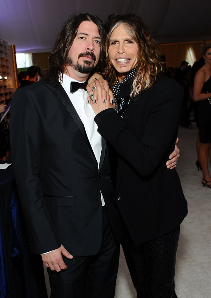 Foo Fighter Dave Grohl and buddy Steven Tyler rocked out at the after parties. Maybe Grohl can cameo on "Idol" this season?<br>