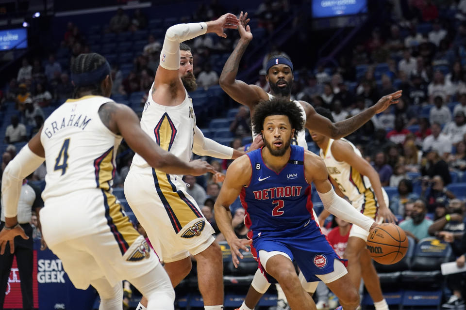 Detroit Pistons guard Cade Cunningham (2) drives to the basket in the first half of an NBA preseason basketball game against the New Orleans Pelicans in New Orleans, Friday, Oct. 7, 2022. (AP Photo/Gerald Herbert)