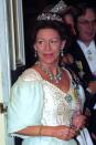 <p>Margaret wears a lavish gown and coordinated jewels to the Portuguese embassy in London in 1993.</p>