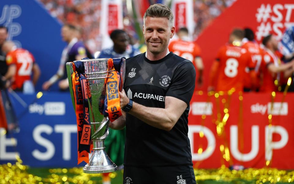 Luton Town manager Rob Edwards celebrates with the trophy - Reuters/Matthew Childs