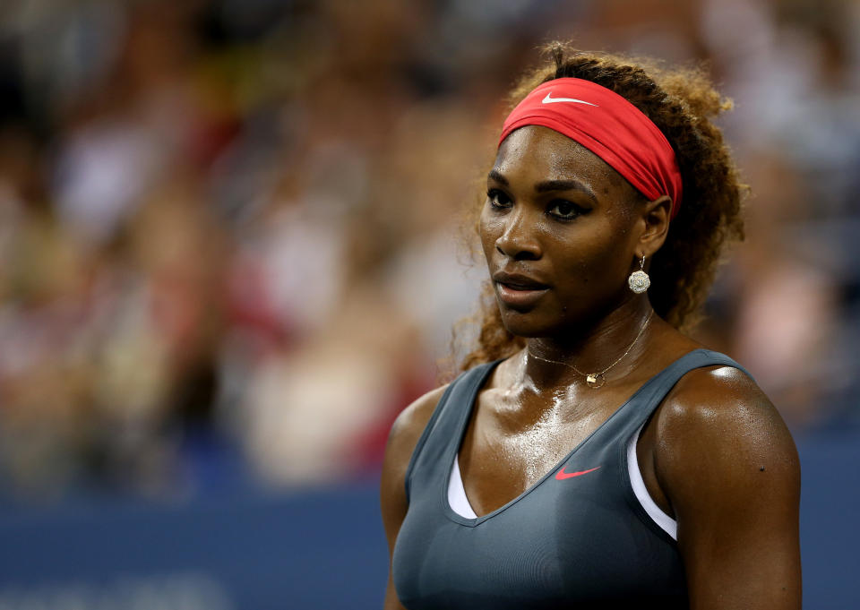 NEW YORK, NY - AUGUST 26:  Serena Williams of the United States of America looks on during her women's singles first round match against Francesca Schiavone of Italy on Day One of the 2013 US Open at USTA Billie Jean King National Tennis Center on August 26, 2013 in the Flushing neighborhood of the Queens borough of New York City.  (Photo by Matthew Stockman/Getty Images)