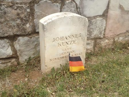 The tombstone of German soldier Johannes Kunze is seen at a cemetery for German and Italian prisoners of war at the Fort Reno Prisoners of War Cemetery in El Reno Oklahoma in this picture taken May 28, 2014. REUTERS/Heide Brandes