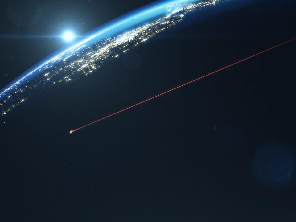 illustration shows orion capsule fireball streaking toward earth