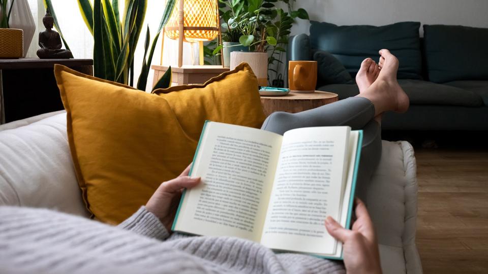 Person reading on couch