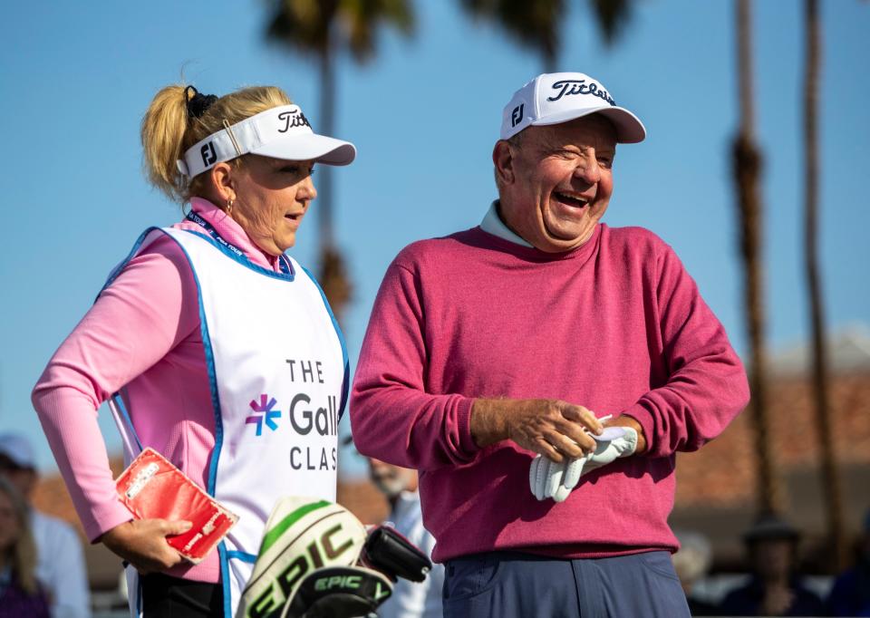 Billy Mayfair laughs with his wife and caddie Tami Mayfair before teeing off on 10 during the first round of the Galleri Classic in Rancho Mirage, Calif., Friday, March 24, 2023. 