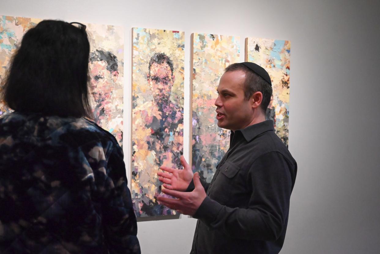 Artist Joshua Meyer and his eight-piece installation "Eight Approaches" at the Worcester Art Museum.