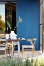<p> A lick of paint, no matter its color, can do wonders in smartening up a lackluster space. And, seeing as you only need to buy the paint and a few brushes, it's an affordable update to make. </p> <p> To really turn heads this season, why not create a statement feature wall with a bold hue? This vibrant blue will instantly make a space feel on-trend. </p> <p> 'Decorating the exterior not only weatherproofs and protects your home, but it's also the perfect opportunity to add design personality to the outdoor space,' says Ruth Mottershead, Creative Director of Little Greene. 'I love to use color in unexpected or surprising ways to update an outside area. Even the smallest outdoor space can be transformed with a splash of color into a place in which to escape and retreat to at the end of the day.' </p> <p> It's a perfect solution if you're after low maintenance garden ideas, too. </p>