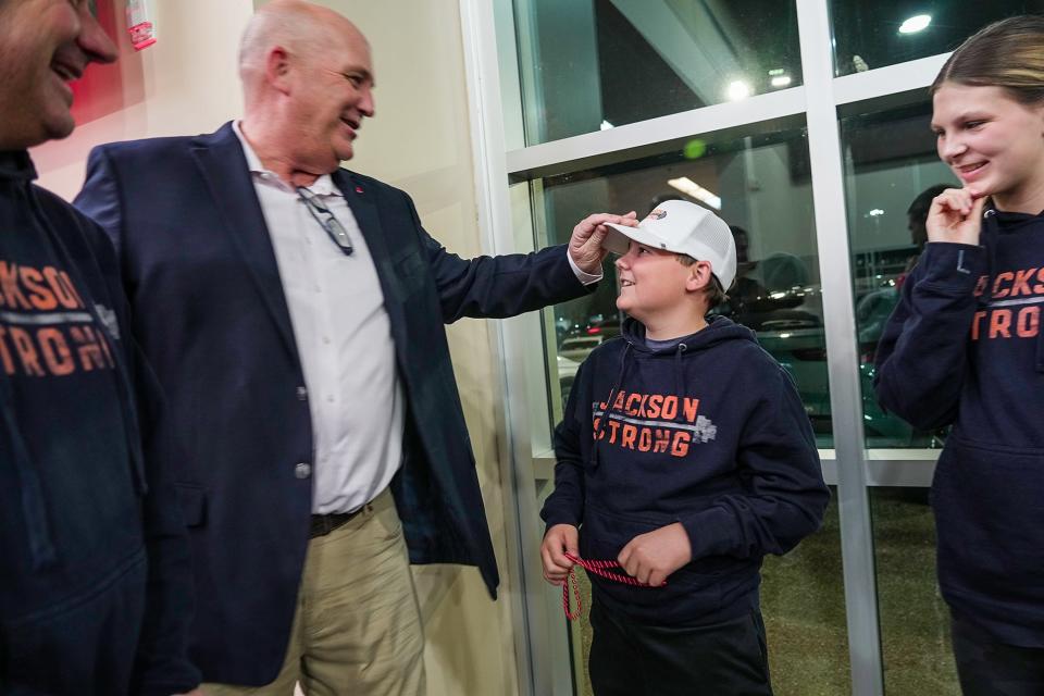 LLS volunteer Steven Robert speaks with Jackson Lundquist, 13, at the Leukemia & Lymphoma Society's Student Visionary program at the Austin Infinity dealership in North Austin in early January. Nineteen high school teams will raise money to help fund treatment, research and advocacy. Jackson was diagnosed with leukemia in 2022.