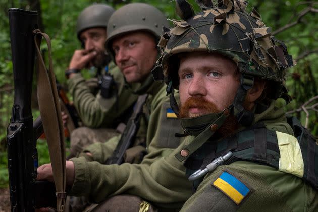 Ukrainian servicemen take rest in a recently retaken village north of Kharkiv, east Ukraine, Sunday, May 15, 2022. (AP Photo/Mstyslav Chernov) (Photo: via Associated Press)