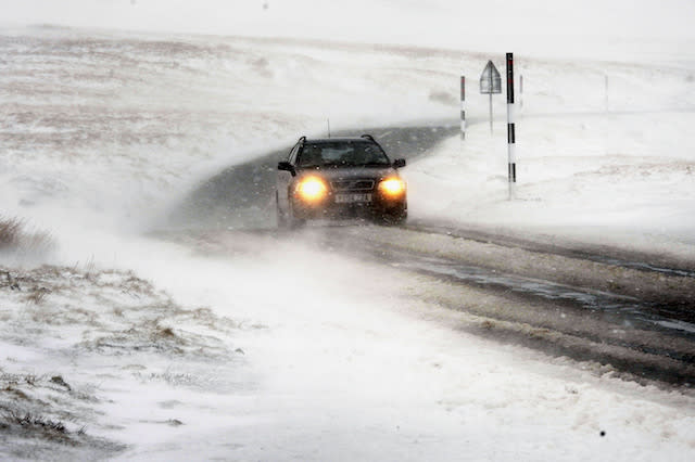 A blizzard makes driving difficult at the Buttertubs Pass near Hawes with snow,ice and blizzard conditions affecting many roads Picture Date: Monday, February 23 , 2015. Photo Credit Should Read John Giles/PA