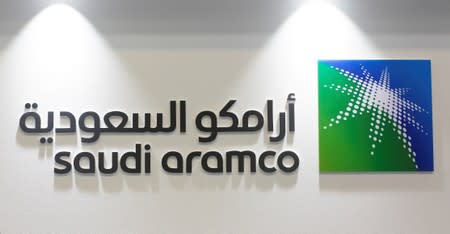 FILE PHOTO: FILE PHOTO: Logo of Saudi Aramco is seen at the 20th Middle East Oil & Gas Show and Conference (MOES 2017) in Manama