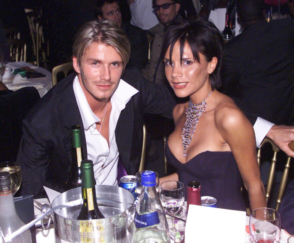 LONDON - OCTOBER 6: British footballer David Beckham and wife pop star Victoria Beckham attend the MOBO awards at the Royal Albert Hall on October 6, 1999 in London. (Photo by Dave Hogan/Getty Images)