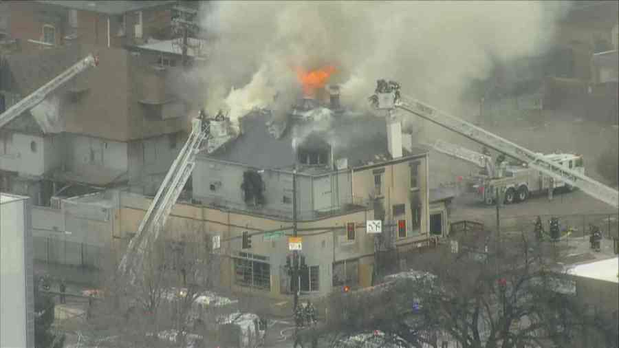 A large fire burning in a home at Colfax and Franklin Street