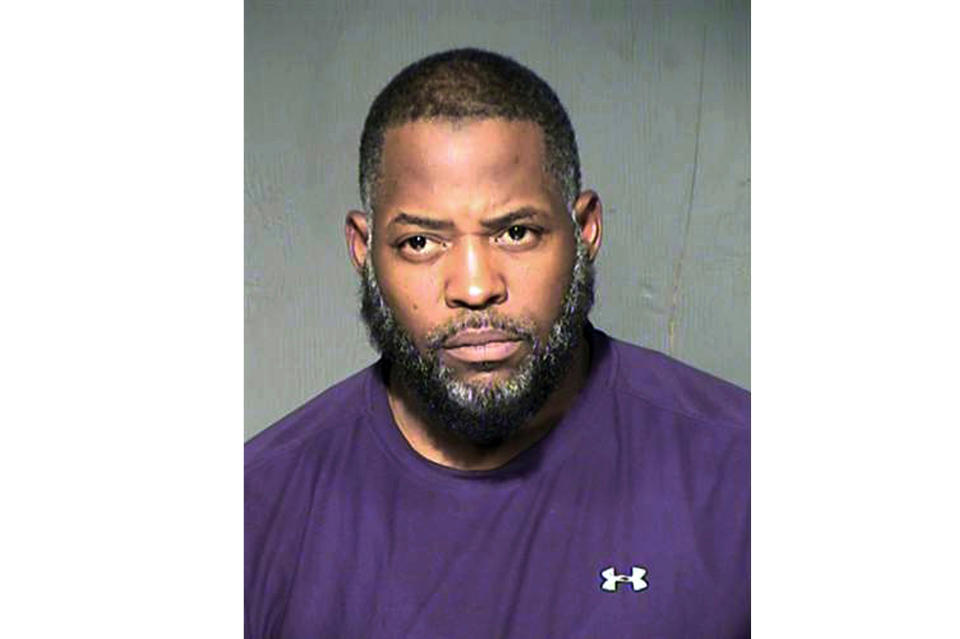 FILE - This undated file photo provided by the Maricopa County Sheriff's Department shows Abdul Malik Abdul Kareem. A federal judge refused to toss out the entire case against Kareem convicted of providing guns to and training two friends who attacked a Prophet Muhammad cartoon contest outside Dallas, but said this week he should be retried on a single count of transporting weapons across state lines.(Maricopa County Sheriff's Department via AP, File)