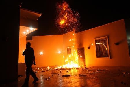 The U.S. Consulate in Benghazi is seen in flames during a protest by an armed group said to have been protesting a film being produced in the United States September 11, 2012. REUTERS/Esam Al-Fetori