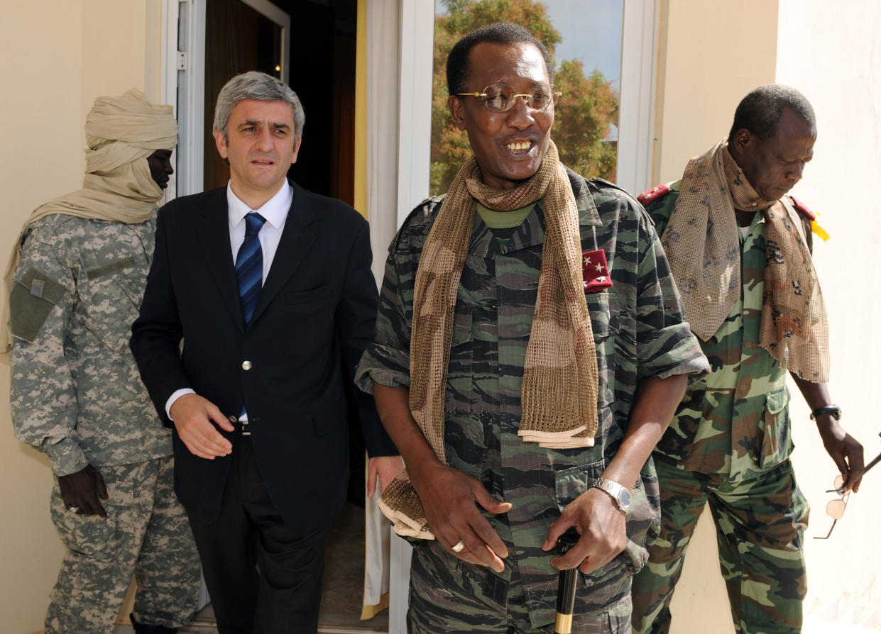 FILE - In this Wednesday, Feb. 6, 2008 file photo, Chad's President Idriss Deby Itno, center-right, meets with French Defense Minister Herve Morin, center-left, in N'Djamena, Chad. Deby, who ruled the central African nation for more than three decades, was killed on the battlefield Tuesday, April 20, 2021 in a fight against rebels, the country's top military commander announced on national television and radio. (Pascal Guyot/Pool Photo via AP, File)