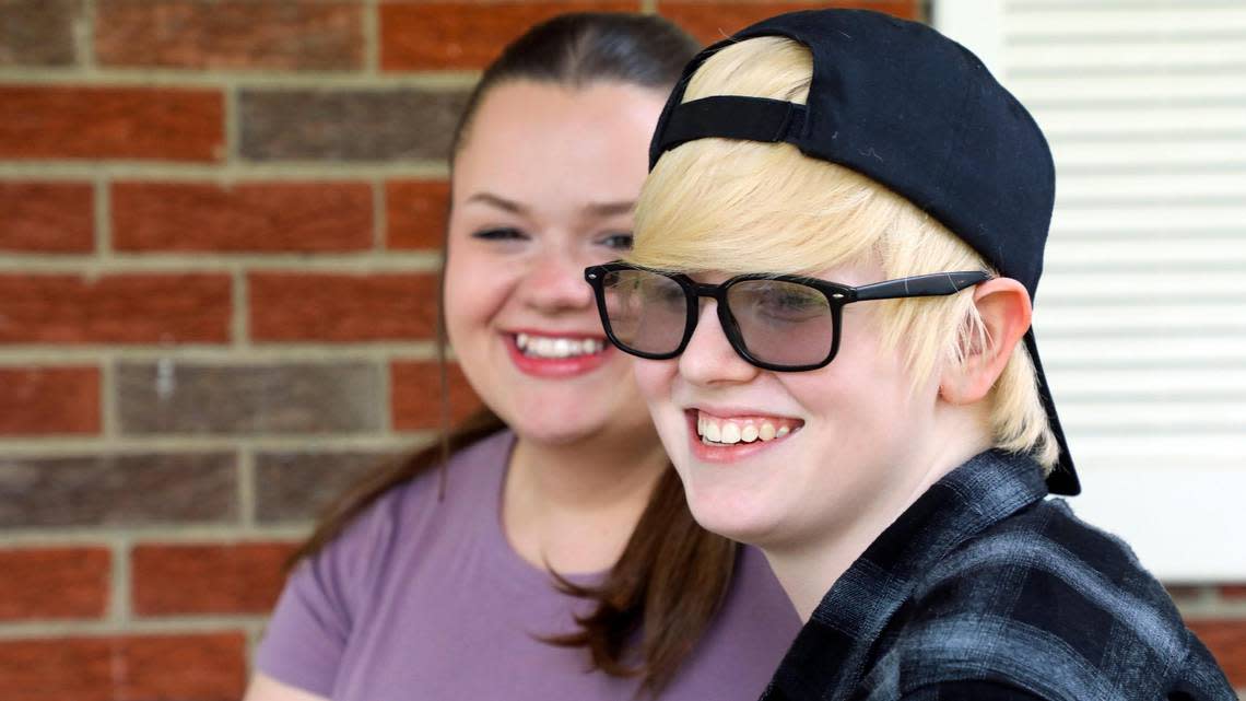 Milo Calloway, 16, right, sits with his sister, Natalee, at their Lexington home, May 22, 2023. Milo and his family are concerned about SB150 that passed out of the Kentucky Legislature banning gender-affirming care for transgender youth.