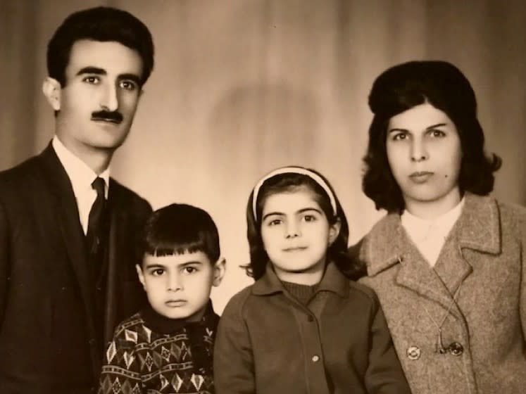 A family portrait of Hassan, Behrooz, Sholeh, and Farideh Moghaddam, taken in Iran in 1967. Two years later the Moghaddam family immigrated to the United States where they are now citizens. (Courtesy of the Moghaddam family)