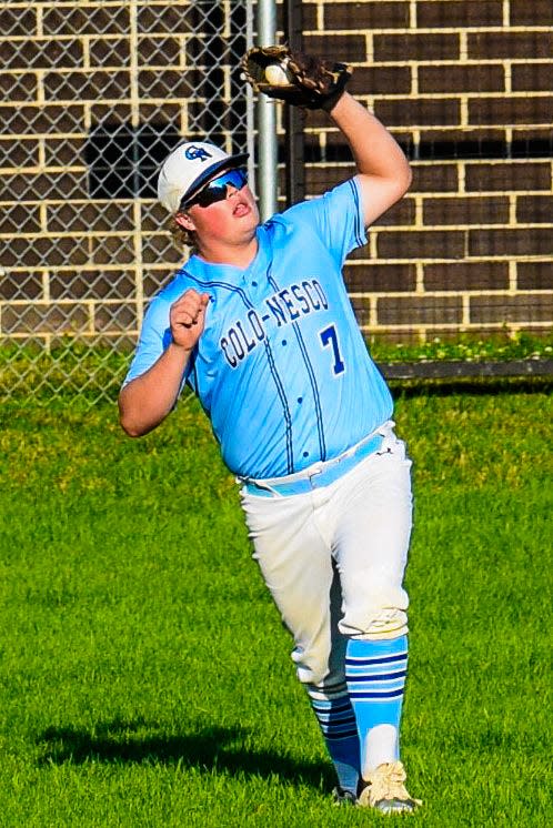 Colo-NESCO's Trenton Beard snares a fly ball in right field during the Royals' 8-0 loss to South Hamilton in the Class 1A District 3 quarterfinal game at Zearing July 3.