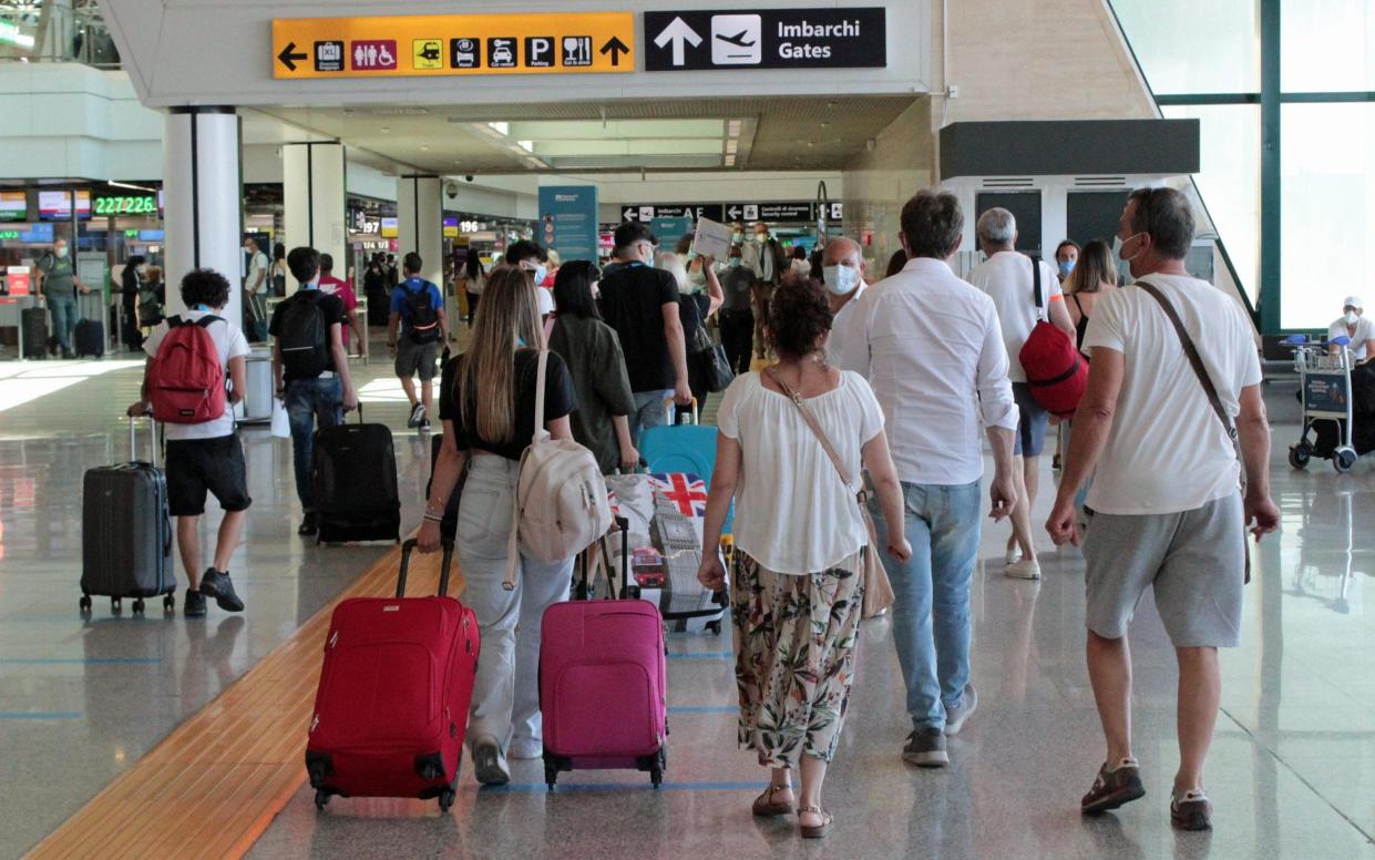 Rome's Fiumicino airport. Visitors from Britain will be able to show their UK vaccine certificates - EPA