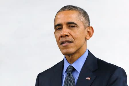 U.S. President Barack Obama delivers remarks on the recent shootings in San Bernardino, after meeting with victims' families at Indian Springs High School in San Bernardino, California December 18, 2015. REUTERS/Jonathan Ernst