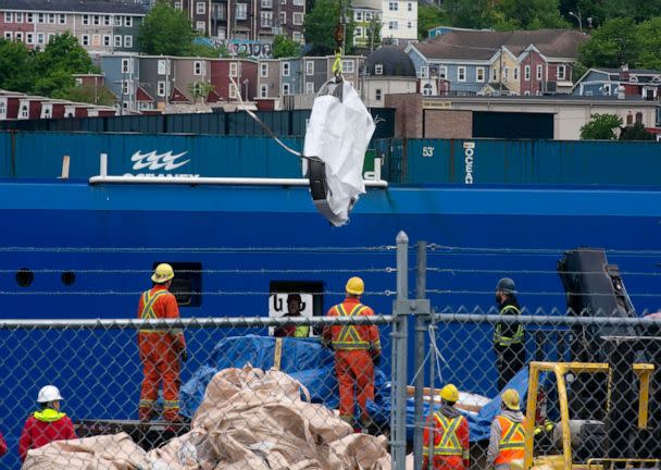 PHOTO: Debris from the Titan submersible, recovered from the ocean floor near the wreck of the Titanic, is unloaded from the ship Horizon Arctic at the Canadian Coast Guard pier in St. John's, Newfoundland, June 28, 2023. (Paul Daly/The Canadian Press via AP)