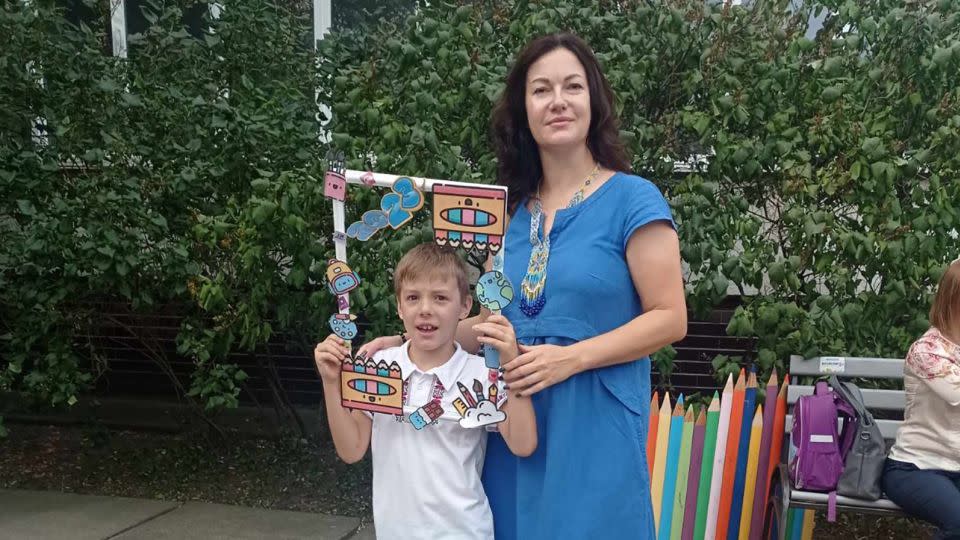 Kateryna Pylypenko pictured with her son on his first day of school on Friday. - Kateryna Pylypenko