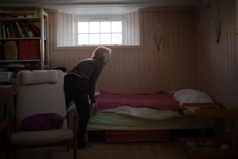 The Wider Image: Quarantine millennials face bedtimes and old rules as they move home