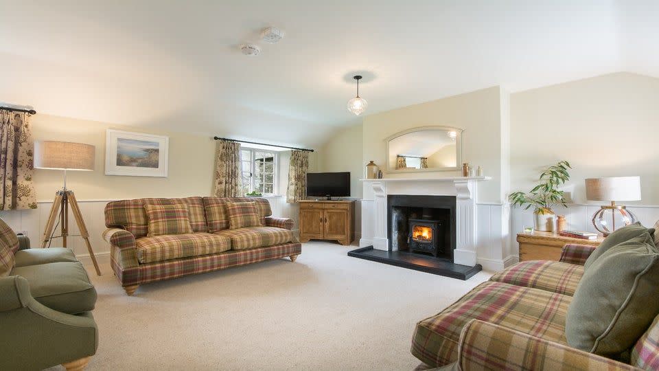 <p>This traditional stone and slate Christmas cottage was once part of Triggabrowne, a traditional Cornish farming settlement. The first floor hosts the sitting room and kitchen, a clever twist allowing you to spend more time enjoying the wintry countryside views surrounding Fortescue. </p><p><strong>Be sure to... </strong>Discover the wide shingle beaches and turquoise waters at the coast between Polruan and Polperro. The National Trust looks after most of the nearby land, so while you’re enjoying those bracing coastal walks, it’s good to know you’re also contributing to the upkeep of the footpaths you’re walking along.</p><p><strong>Sleeps: </strong>6</p><p><strong>Pets:</strong> No</p><p><strong>Price:</strong> £1,099 for 7 nights over Christmas and New Year (short breaks can be booked one month before for peak periods)</p><p><a class="link " href="https://go.redirectingat.com?id=127X1599956&url=https%3A%2F%2Fwww.nationaltrust.org.uk%2Fholidays%2Ffortescue-cornwall&sref=https%3A%2F%2Fwww.redonline.co.uk%2Ftravel%2Finspiration%2Fg33891719%2Fchristmas-cottage%2F" rel="nofollow noopener" target="_blank" data-ylk="slk:FIND OUT MORE;elm:context_link;itc:0;sec:content-canvas">FIND OUT MORE</a></p>