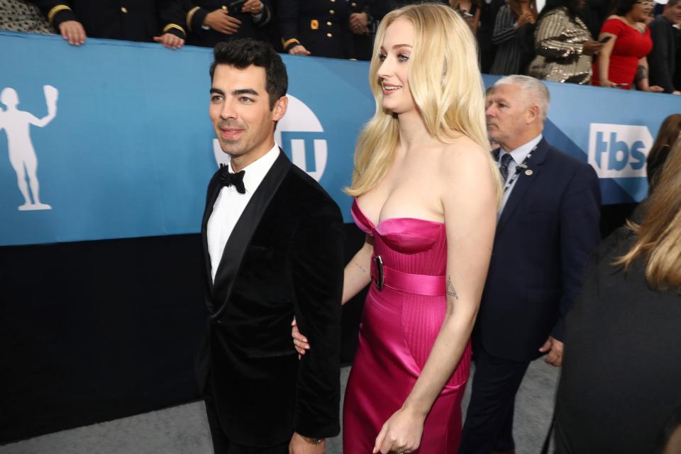 Sophie Turner (right), pictured with Joe Jonas at the 2020 SAG Awards, is opening up about her divorce from ex Joe Jonas and friendship with pop star Taylor Swift.