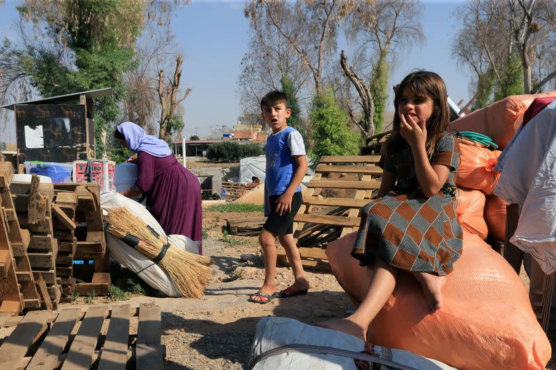 Yazidi displaced family al-Hamo leave their home in Sharya town and head back to Sinjar