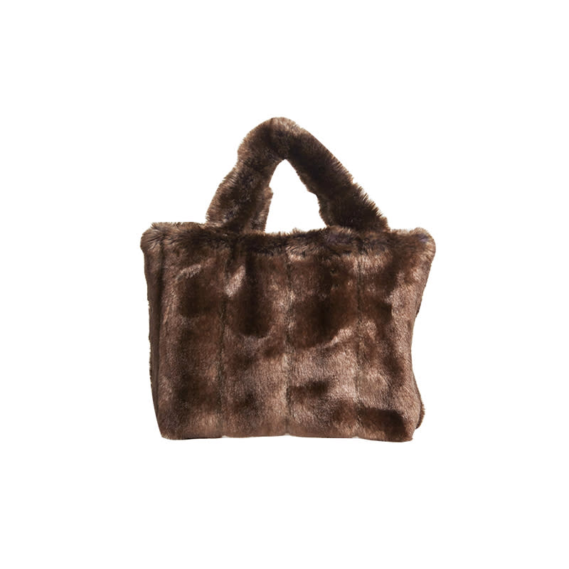 <a rel="nofollow noopener" href="https://staud.clothing/collections/accessories/products/deneuve-bag?variant=29721395211" target="_blank" data-ylk="slk:Deneuve Bag, Staud, $285;elm:context_link;itc:0;sec:content-canvas" class="link ">Deneuve Bag, Staud, $285</a><p> <strong>Related Articles</strong> <ul> <li><a rel="nofollow noopener" href="http://thezoereport.com/fashion/style-tips/box-of-style-ways-to-wear-cape-trend/?utm_source=yahoo&utm_medium=syndication" target="_blank" data-ylk="slk:The Key Styling Piece Your Wardrobe Needs;elm:context_link;itc:0;sec:content-canvas" class="link ">The Key Styling Piece Your Wardrobe Needs</a></li><li><a rel="nofollow noopener" href="http://thezoereport.com/fashion/shopping/best-celebrity-looks-this-week-vanity-fair-video-august-22/?utm_source=yahoo&utm_medium=syndication" target="_blank" data-ylk="slk:Salma Hayek's Floral Maxi Dress Is So Flattering;elm:context_link;itc:0;sec:content-canvas" class="link ">Salma Hayek's Floral Maxi Dress Is <i>So</i> Flattering</a></li><li><a rel="nofollow noopener" href="http://thezoereport.com/entertainment/culture/kim-kardashian-west-skincare-tips/?utm_source=yahoo&utm_medium=syndication" target="_blank" data-ylk="slk:Kim Kardashian West Credits This Ingredient For Saving Her Skin;elm:context_link;itc:0;sec:content-canvas" class="link ">Kim Kardashian West Credits This Ingredient For Saving Her Skin</a></li> </ul> </p>