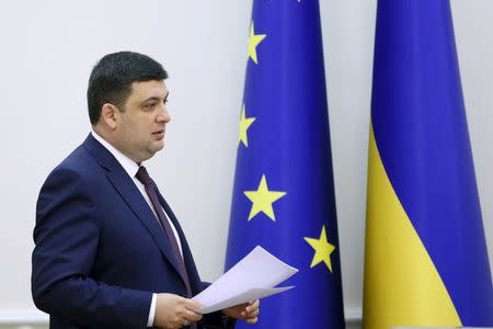 Ukrainian Prime Minister Volodymyr Groysman walks in to attend a government meeting in Kiev, Ukraine, April 20, 2016. REUTERS/Valentyn Ogirenko