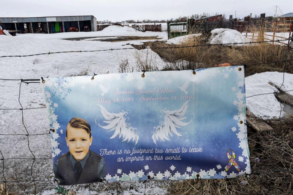 PHOTO: A picture of J.J. Vallow is part of a memorial to him, hung on fence opposite the property where his body was found in 2020, on April 4, 2023 near Rexburg, Idaho. (Natalie Behring/Getty Images, FILE)