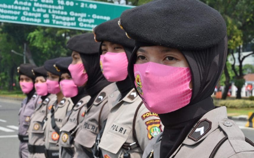 Police outside the presidential palace in Jakarta.  - ADEK BERRY/AFP