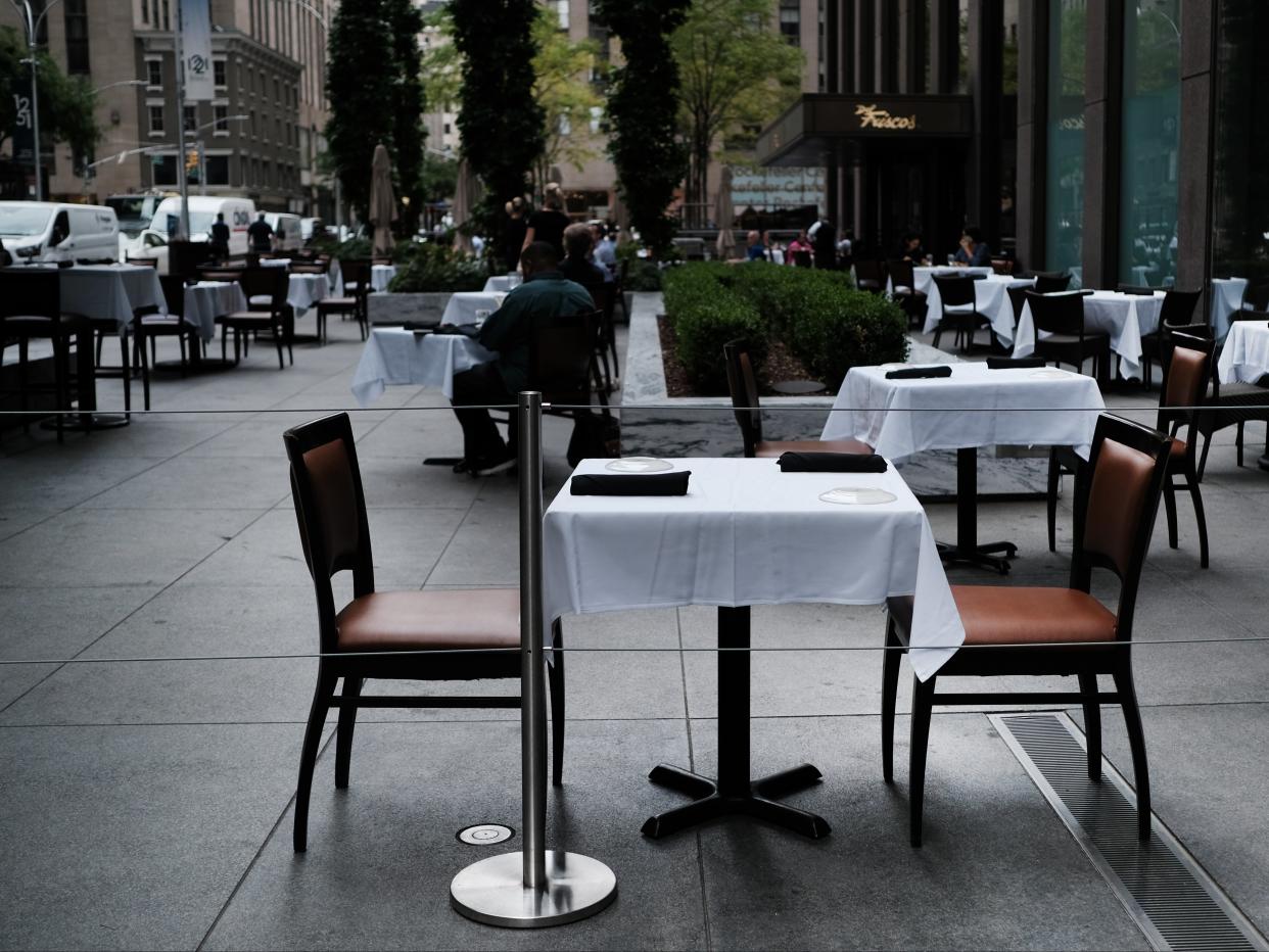 <p>New York City restaurants are currently permitted to serve take-out and to offer sidewalk dining, they are not allowed to offer indoor dining </p> (Getty Images)